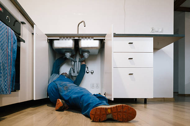 Professional Drain Cleaning technician working in Weare, NH